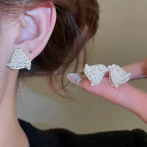 Elegant triangular pearl earrings with micro-set zircon accents on silver studs for women