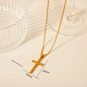 Detailed view of 18K gold plated stainless steel sun cross necklace with dimensions