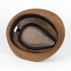 Detail view of woven straw hat interior with size 58 label and 100% paper material tag