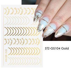 Macro detail of STZ-GS104 gold nail art stickers featuring metallic lines and calligraphy