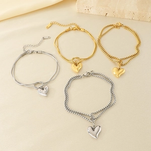 Minimalist double-layered heart charm bracelets in gold and silver stainless steel design
