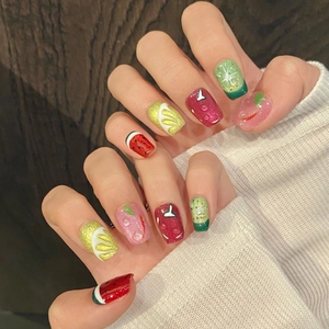 Handmade fruit theme press-on nails with 3D water drops and vibrant summer fruit patterns