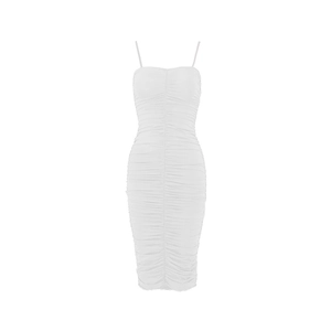 Detail of white ruched bodycon dress showing the fine fabric textures and slim fit style