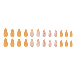 Matte orange almond press-on nails with daisy floral patterns and rhinestone accents