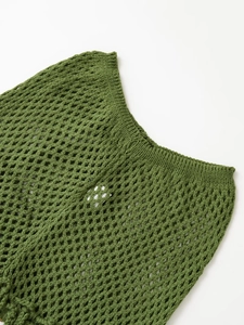 Detail of olive green handmade crochet knit fabric with breathable mesh pattern