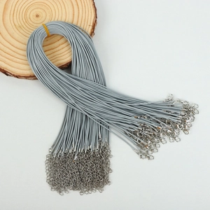 Bundle of gray wax cord necklace strings with silver lobster clasps and extension chains
