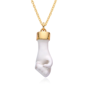 Minimalist white crystal fist pendant necklace with golden finish chain for women