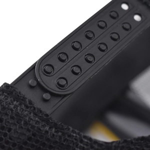Detail of the adjustable snapback closure and breathable mesh on the black trucker hat