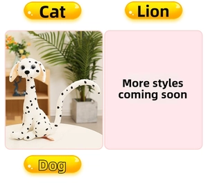 Detailed view of spotted dog plush toy with white and black pattern and orange tag
