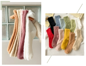 Close-up of thick plush floor socks in various colors with soft mink fleece texture