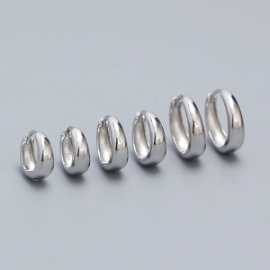Detailed view of polished S925 sterling silver hoop earrings in multiple sizes
