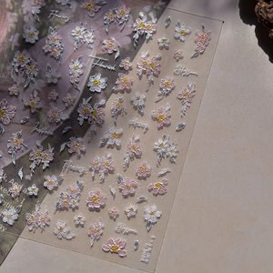 Macro view of TO-5088 3D embossed nail stickers with pink and white floral blossom designs