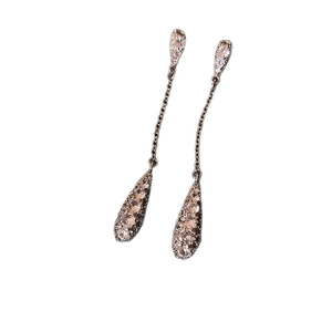 Elegant drop earrings with sparkling pink teardrop crystals and silver pin settings