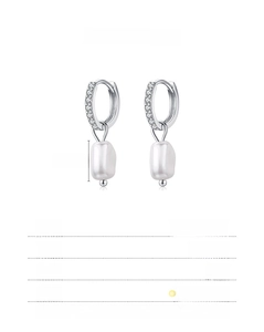 Detailed view of 925 sterling silver hoop earrings featuring baroque freshwater pearls