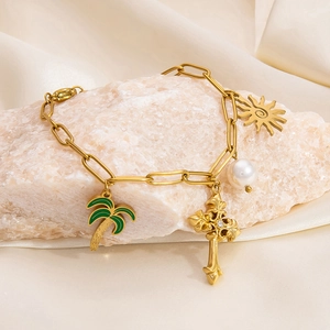 18K gold plated stainless steel bracelet with pearl and tropical charms on pink stone