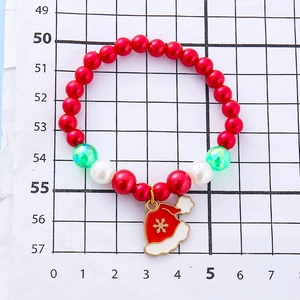 Kids Christmas beaded bracelet with red pearls and red Santa hat enamel pendant