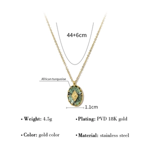 Detail view of 18K gold plated stainless steel necklace with African turquoise pendant