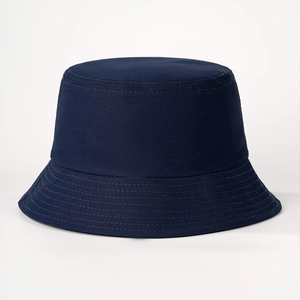 Detail of navy blue cotton bucket hat featuring multi-row stitched reinforced brim