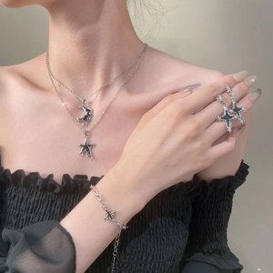 Silver liquid lava necklace set featuring irregular moon and star pendants for women