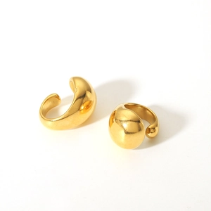 Detailed view of chunky 18K gold plated stainless steel ear cuffs with mirror finish