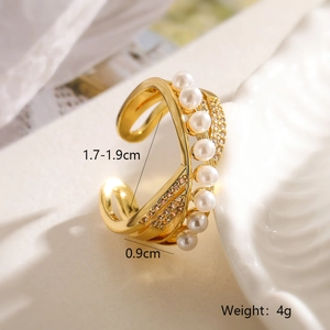 Detail view of 18K gold plated ring showing 0.9cm width pearl and zircon inlay