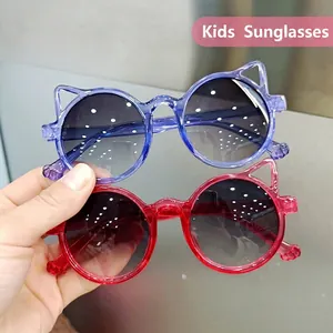 Kids cat ear sunglasses with stylish red and blue frames and dark sun protection lenses