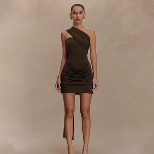 Detail of dark brown one-shoulder ruched mini dress with elegant side draping fabric