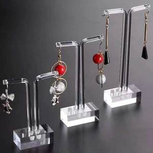 Three-piece set of transparent acrylic T-shape earring display stands in varying heights