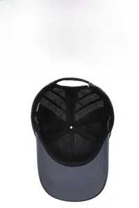 Detail of breathable quick-dry baseball cap showing laser-cut side vents and inner stitching