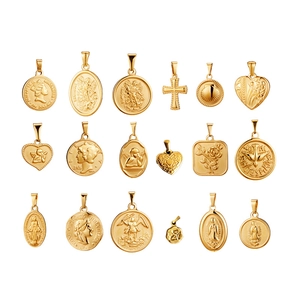 Collection of 17 vintage 18K gold plated charms with coin, cross, and angel designs