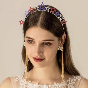 Independence Day star headband with red white and blue rhinestones on a female model