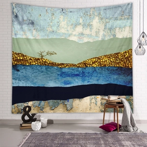 Detailed close-up of a minimalist abstract mountain tapestry on a white textured wall