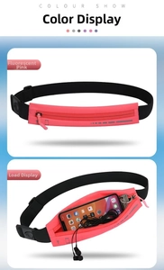 Detail view of pink running belt showing phone storage, headphone port and reflective strip