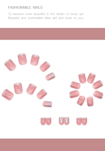 Detail of pink gradient press-on nails with silver glitter and glossy finish