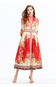 Detail van vintage jurk met lantaarnmouwen, bloemenpatronen en een getailleerde taille