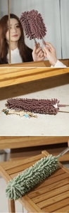 Detail of chenille duster showing retractable stainless steel handle in purple and green