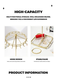 Detail view of gold jewelry stand with 18 hooks and stable square acrylic base
