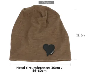 Brown knit beanie size guide showing 30cm width and 29.5cm height dimensions