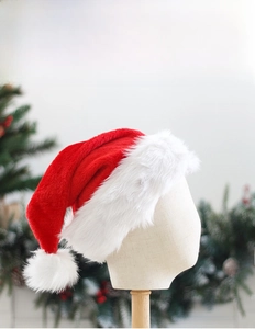 Detail of plush red Santa hat with thick white faux fur trim on a display model