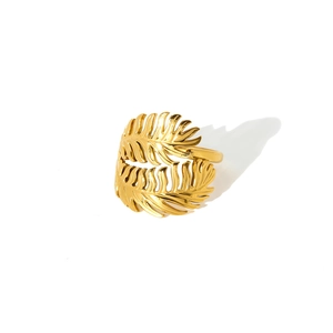 Detail shot of golden double leaf hollow ring in 18K gold plated stainless steel