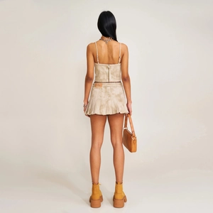Retro khaki denim two-piece set with pleated mini skirt and camisole shown from back