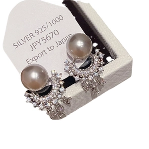 Elegant 925 silver pearl stud earrings with sparkling zircon tassels on a white gift box