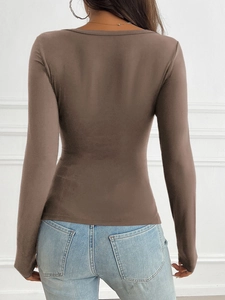 Slim fit brown long sleeve top for women shown from back view with blue jeans
