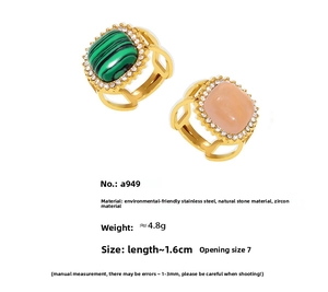 Detail of PVD gold plated stainless steel rings with natural stone and zircon pavé inlay