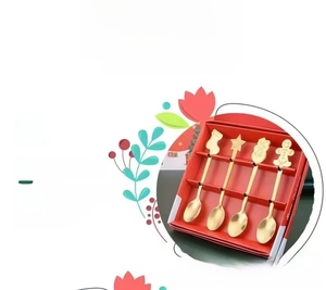 Christmas themed gold stainless steel spoon set in a red decorative gift box