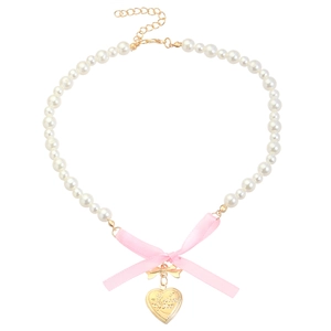 Pink ribbon bow pearl necklace featuring a golden heart pendant on a white background