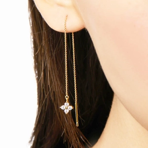 Detail of s925 silver gold butterfly tassel chain earring with zircon clover pendant