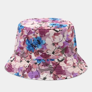 Detail of floral bucket hat featuring pink and blue flower prints with reinforced brim stitching