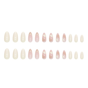 Almond press-on nails set with heart designs and French tips in pink and white
