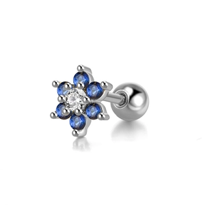 Detailed close-up of a flower stud earring with blue gems and a screw ball back